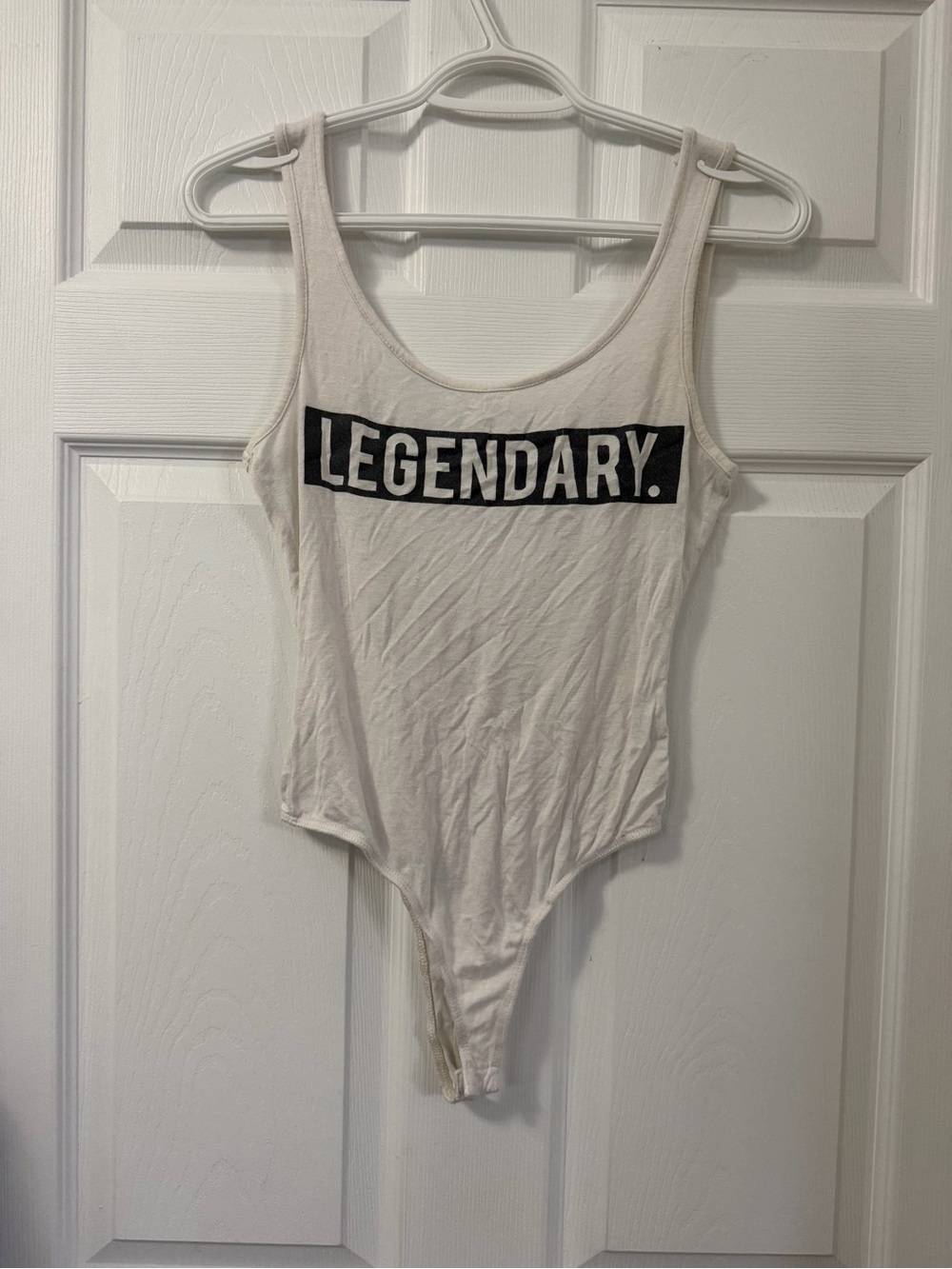 Persaya Ivory Bandeau Bodysuit with Black LEGENDARY. Graphic